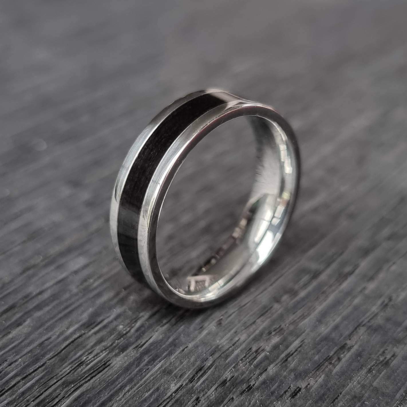 Stainless steel and black oak ring