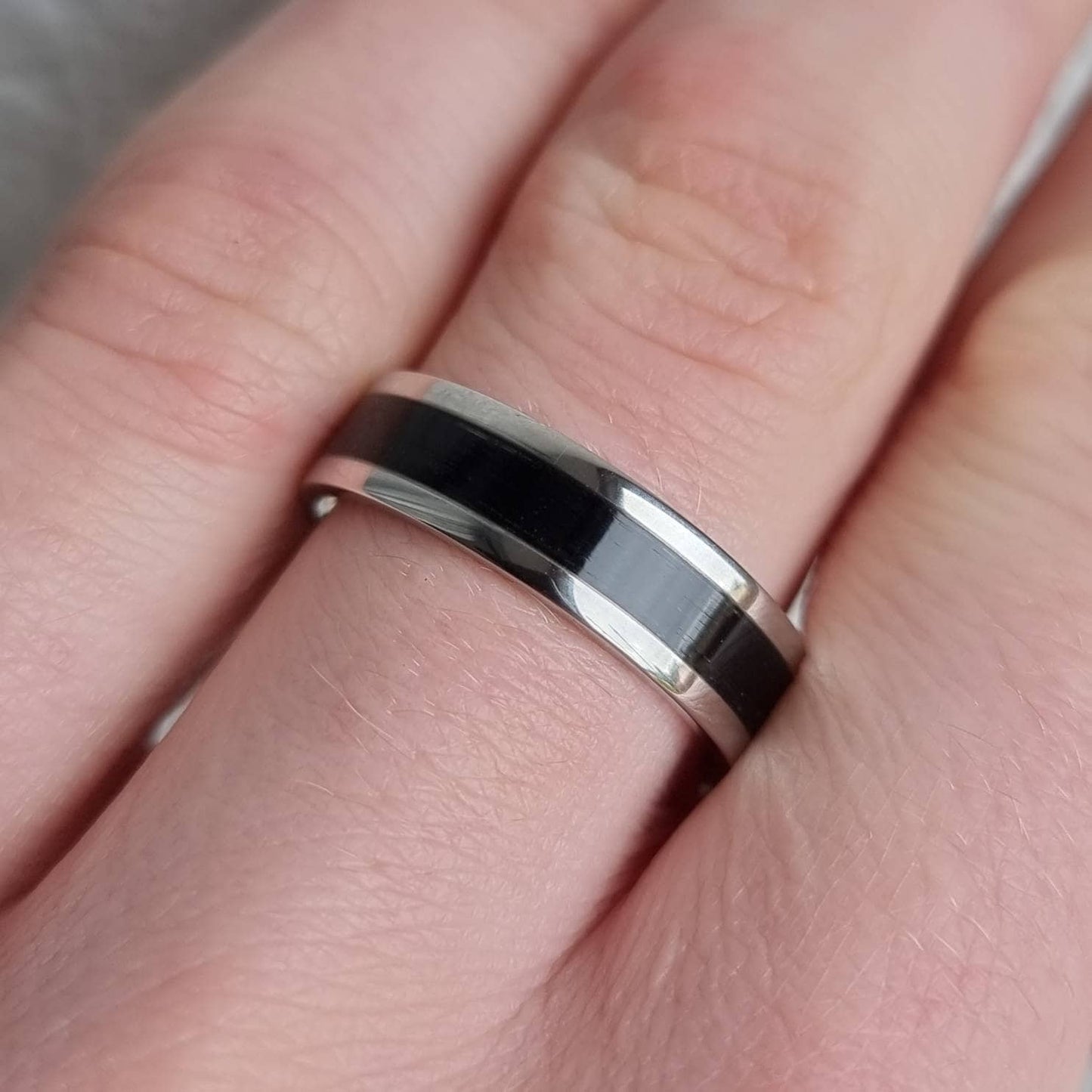 Stainless steel and black oak ring