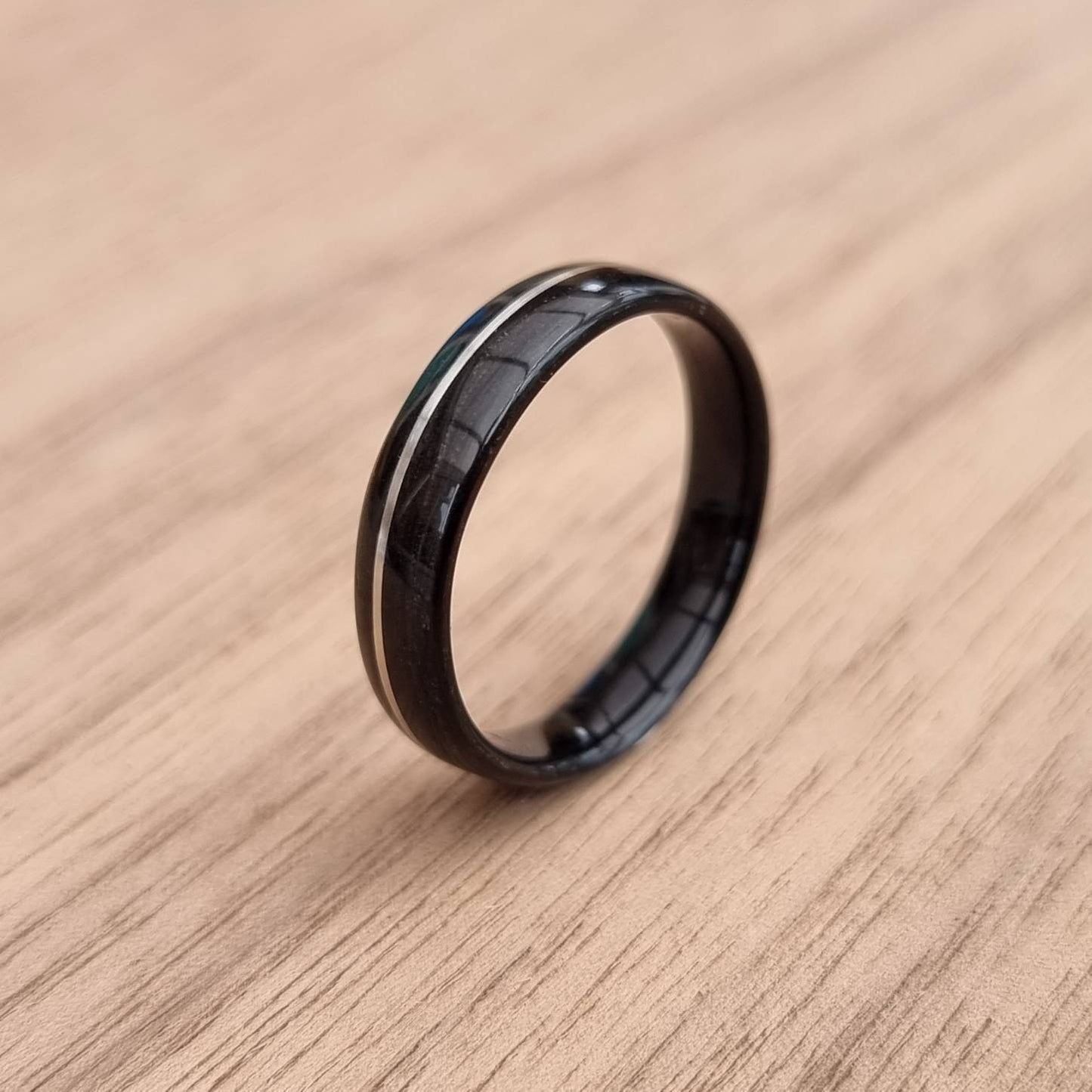 Black oak & sterling silver hand made bent wood ring
