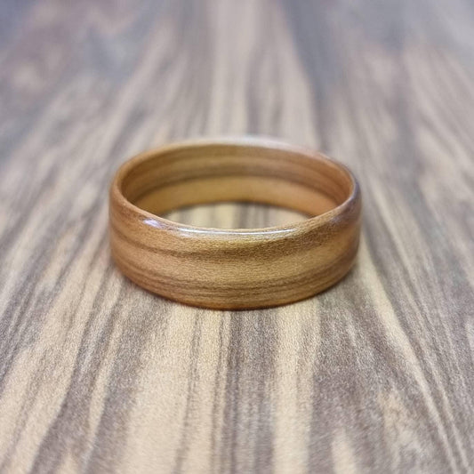 Olive wood hand made bent wood ring