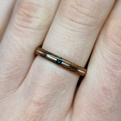 Rosewood and sterling silver with lab created emerald - Hand made bent wood ring - Wooden wedding band - Engagement ring