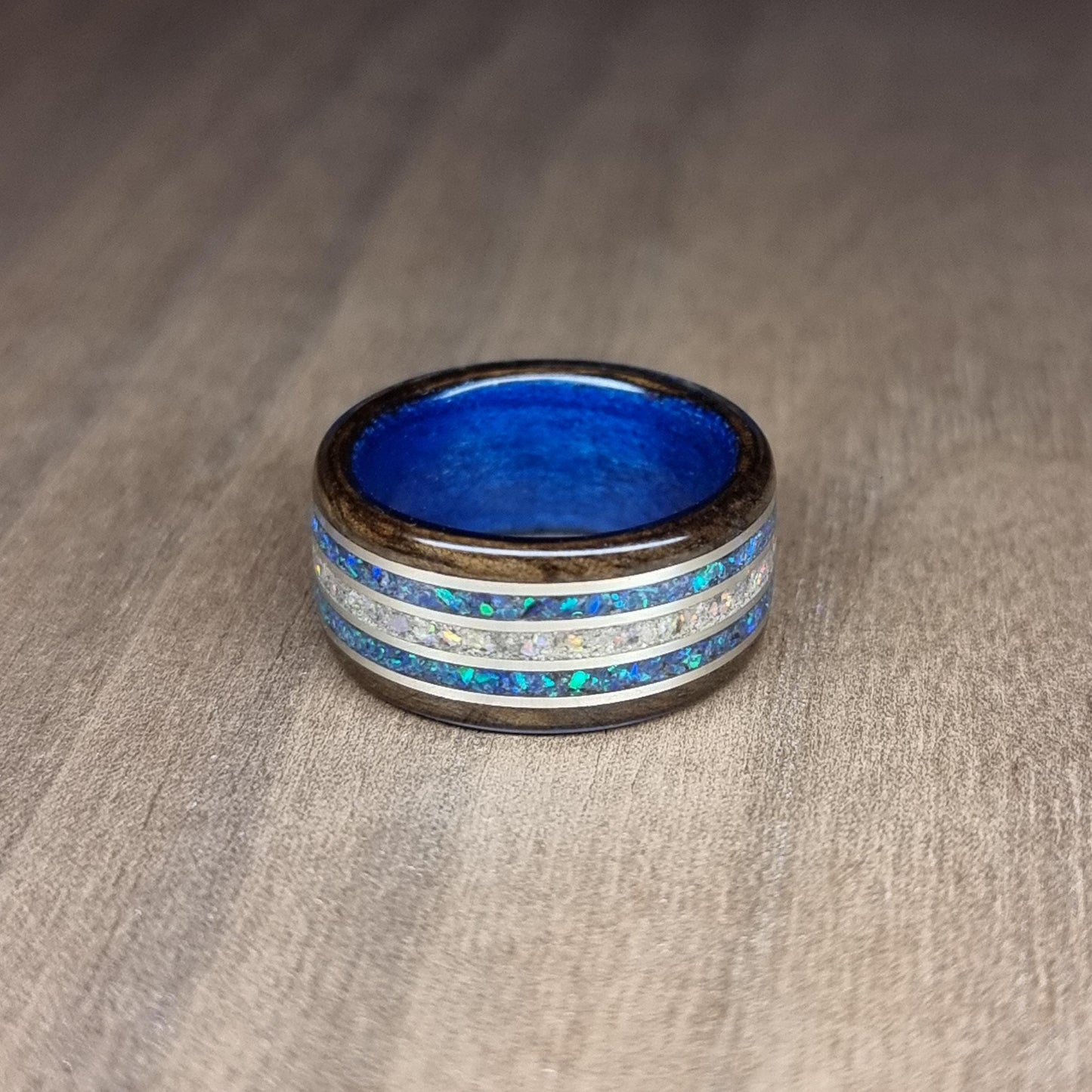 Memorial pet ash ring, smokedeucalyptus & blue tulipwood, crushed blue opal and silver inlays hand made bent wood ring