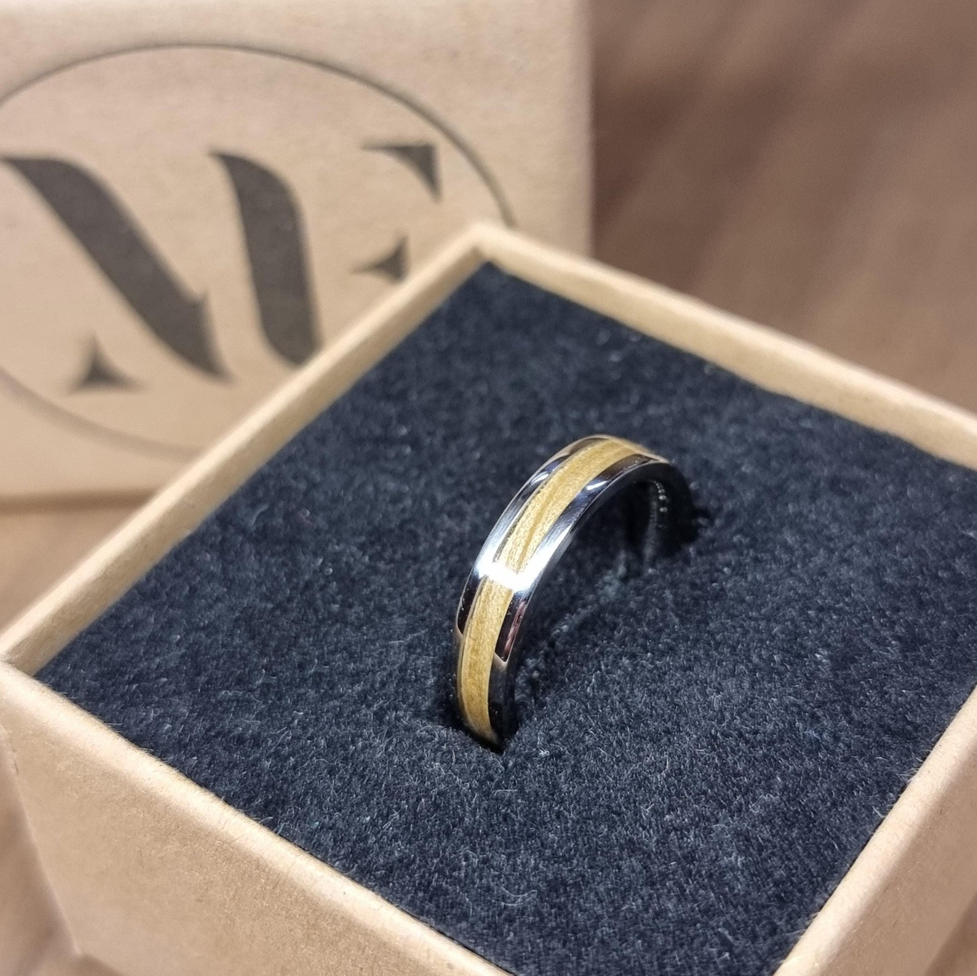 Stainless steel and Oak ring