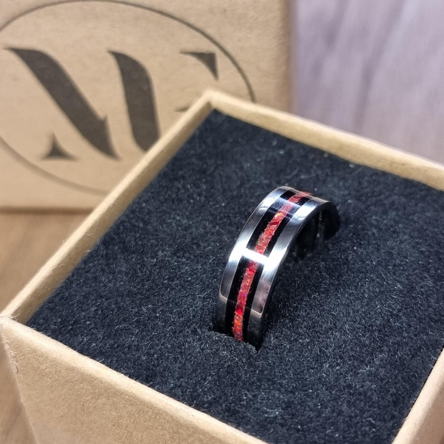 Stainless steel & black oak with red opal ring