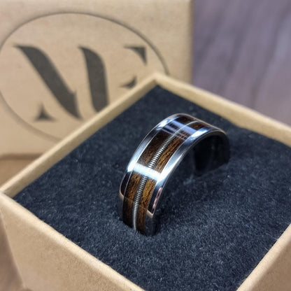 Stainless steel and smoked eucalyptus with guitar string inlay ring