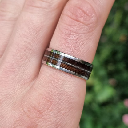 Stainless steel and smoked eucalyptus with guitar string inlay ring
