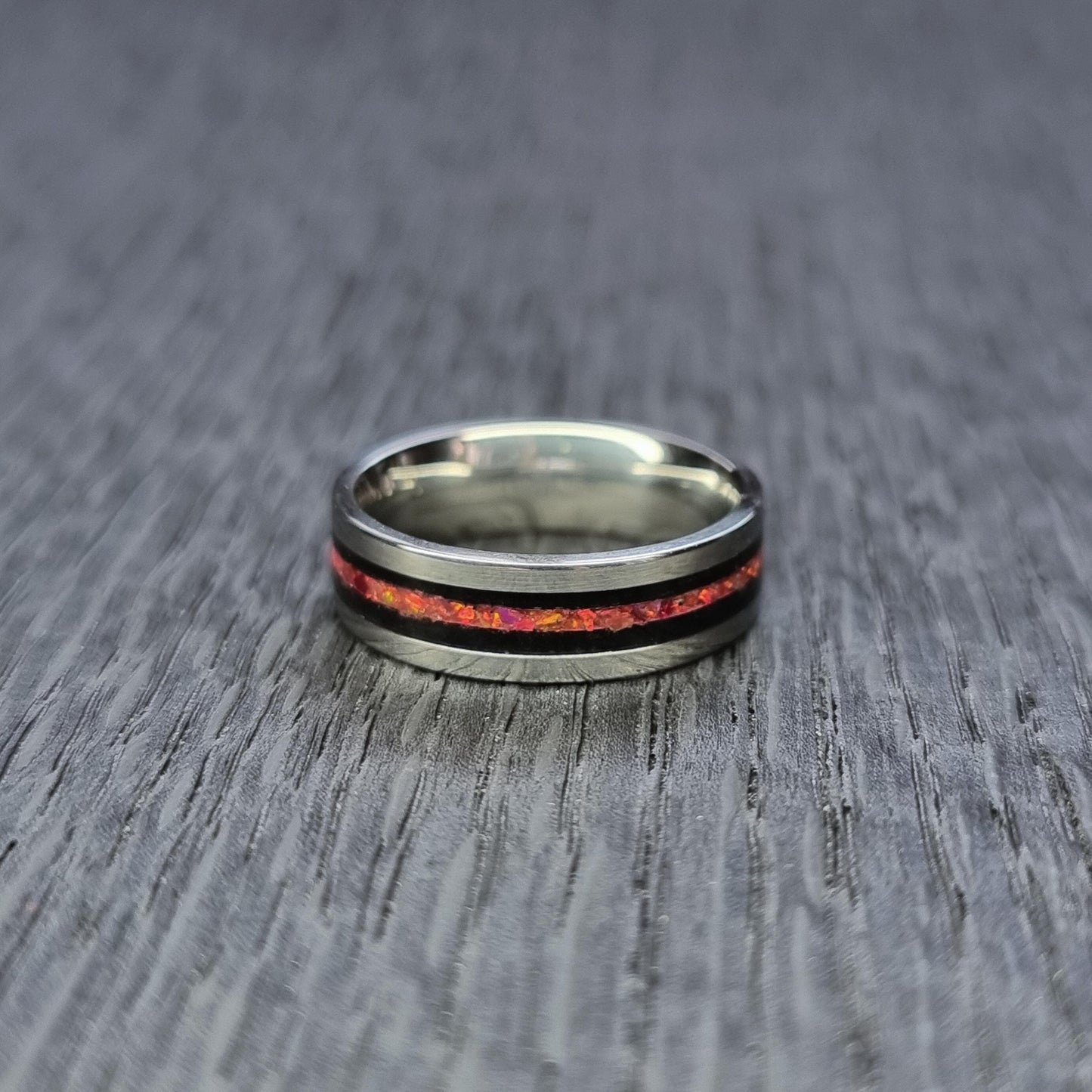 Stainless steel & black oak with red opal ring