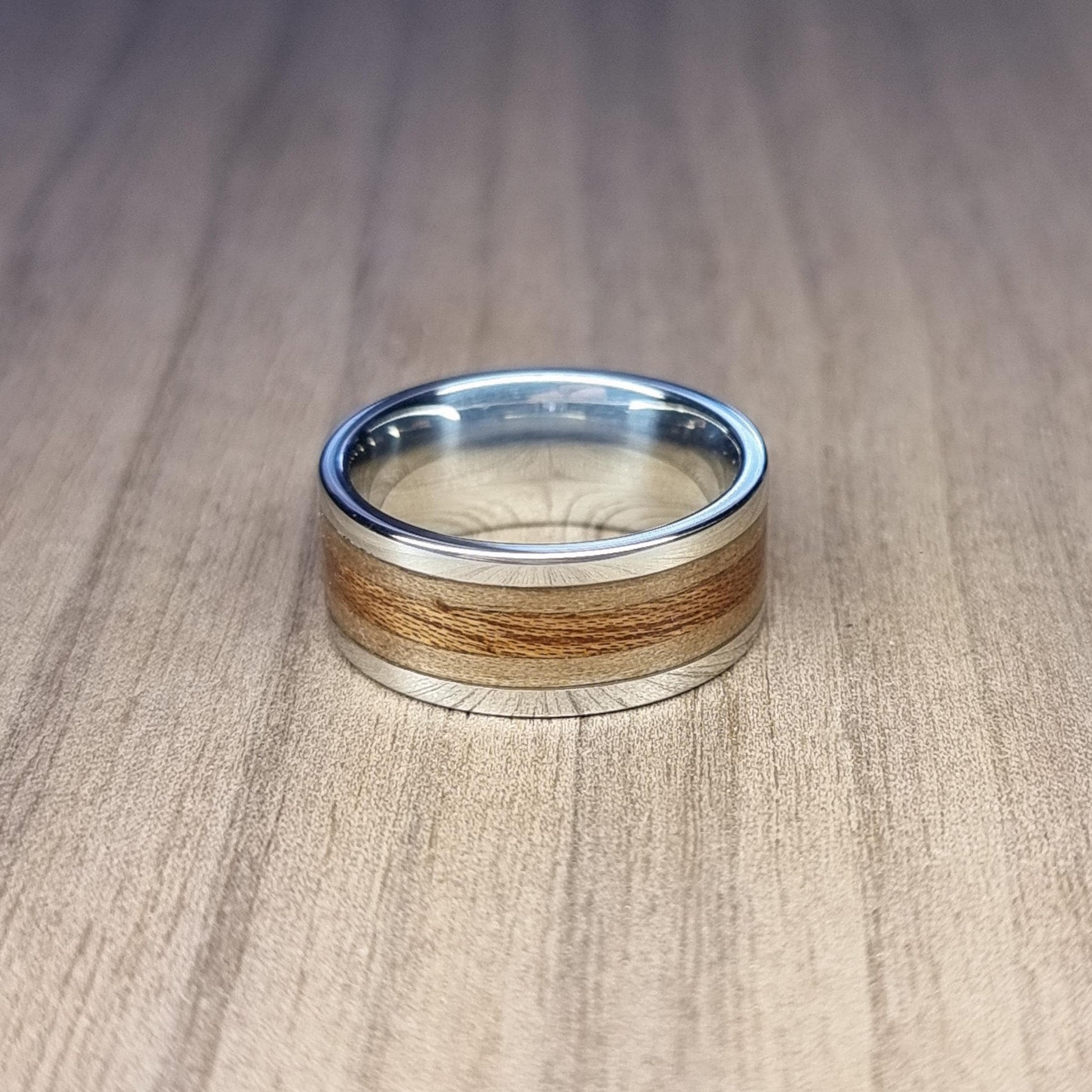 Stainless steel, walnut and sapele ring
