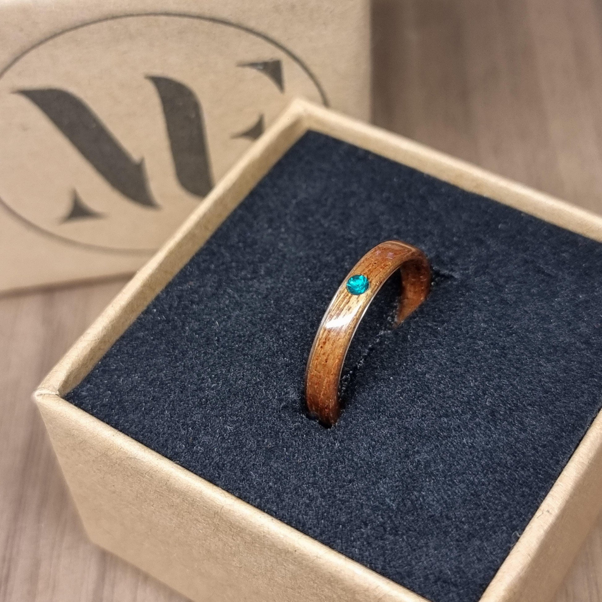 Sapele and lab emerald hand made bent wood ring