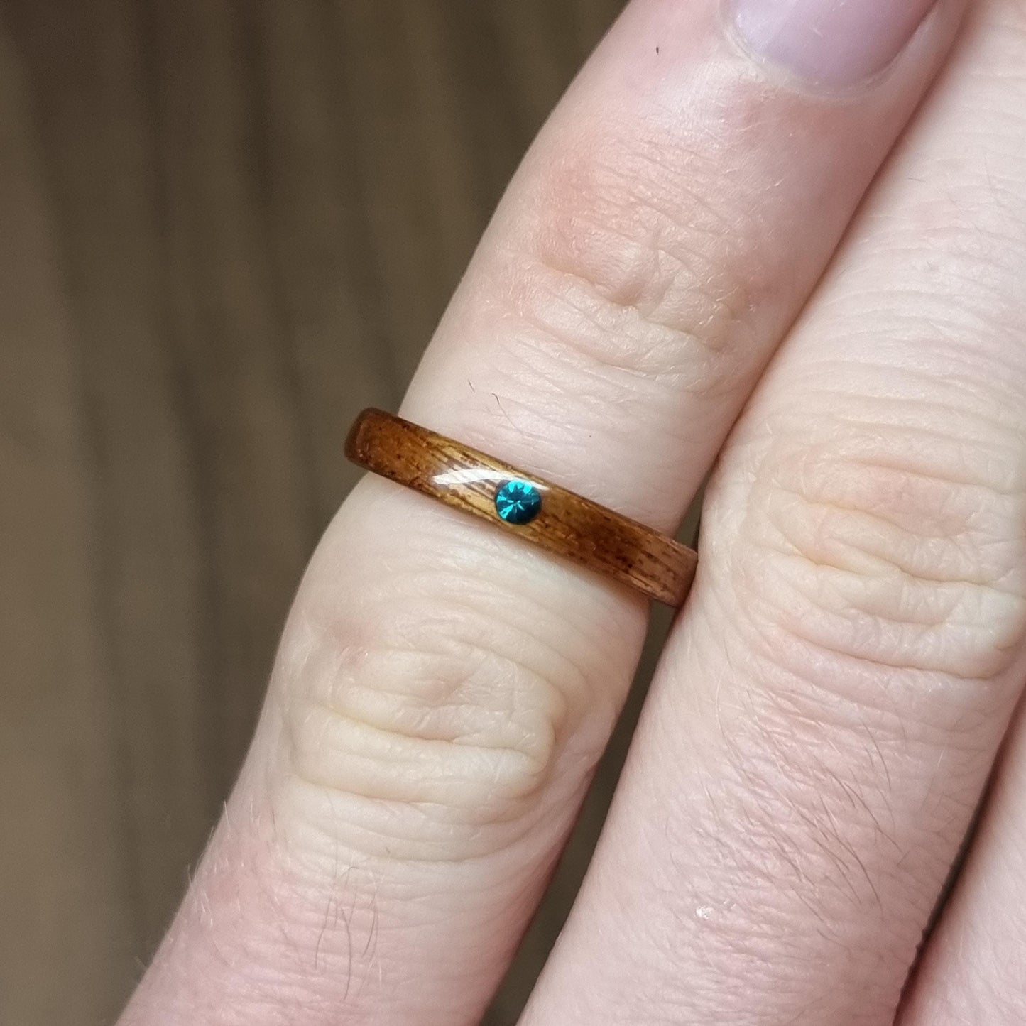 Sapele and lab emerald hand made bent wood ring
