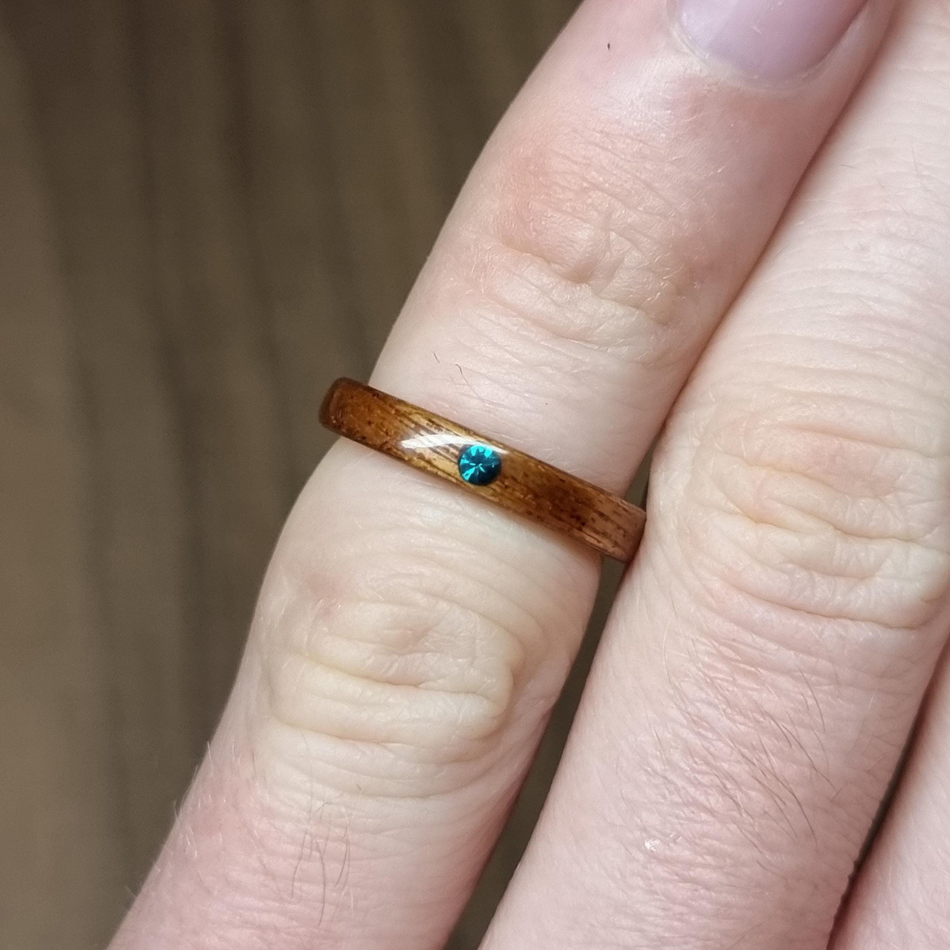 Sapele and lab emerald hand made bent wood ring