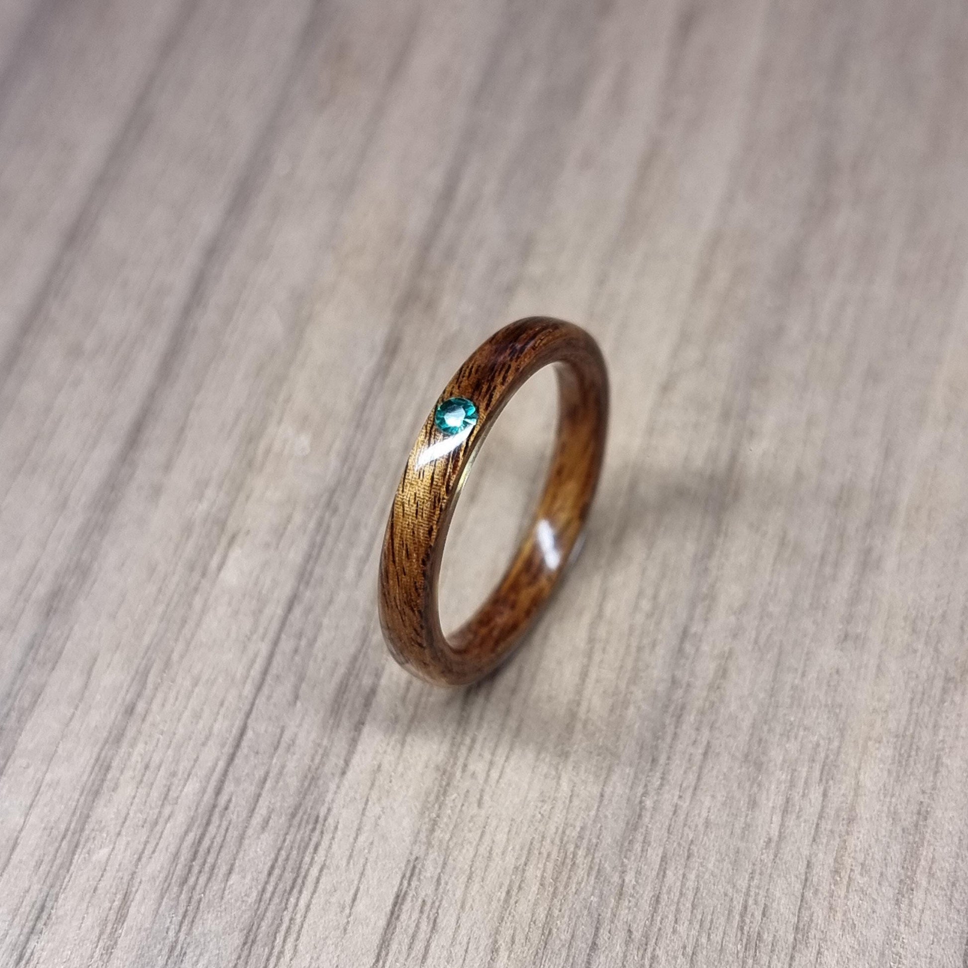 Rosewood and lab emerald hand made bent wood ring