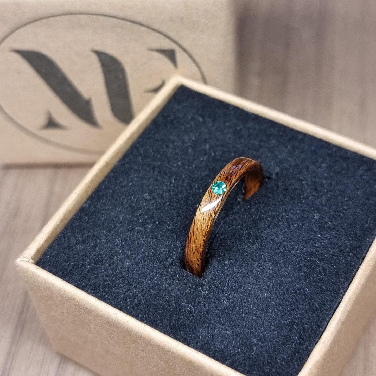 Rosewood and lab emerald hand made bent wood ring