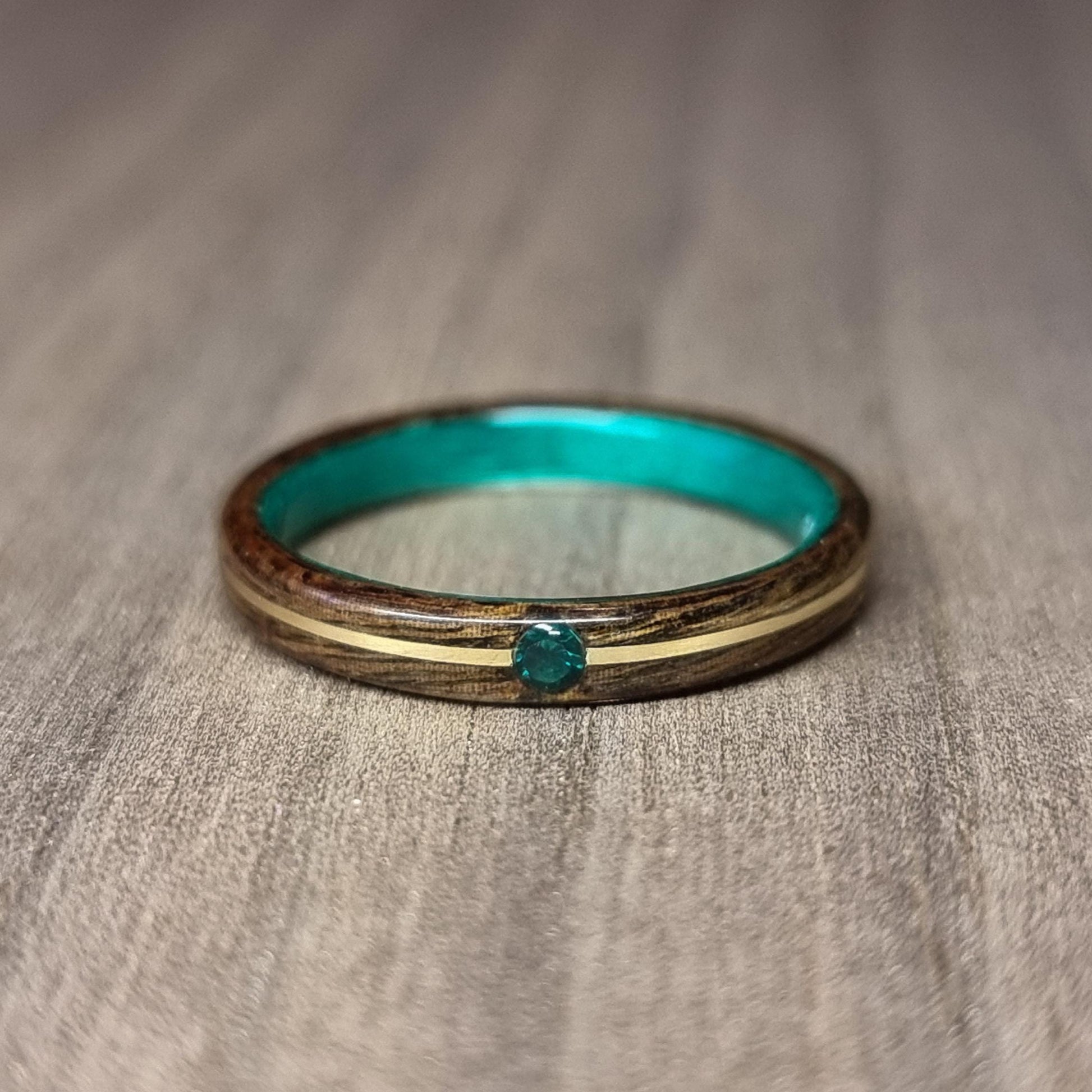 Rosewood and green tulipwood with brass and lab created emerald - Hand made bent wood ring - Wooden wedding band - Engagement ring