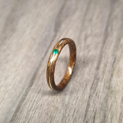 Rosewood and green tulipwood with brass and lab created emerald hand made bent wood ring