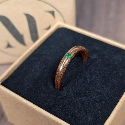 Rosewood and green tulipwood with brass and lab created emerald hand made bent wood ring