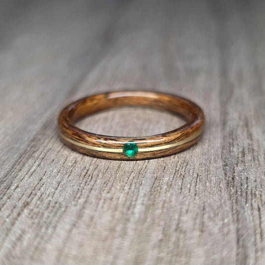 Rosewood and green tulipwood with brass and lab created emerald hand made bent wood ring